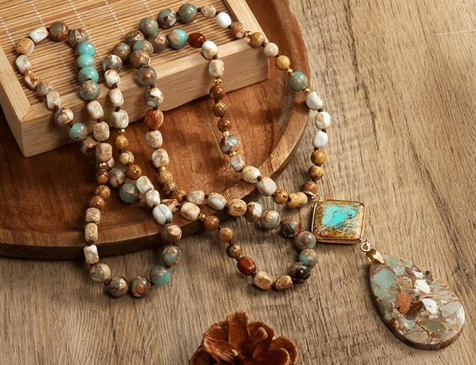 Necklace with a large pendant on a wooden surface