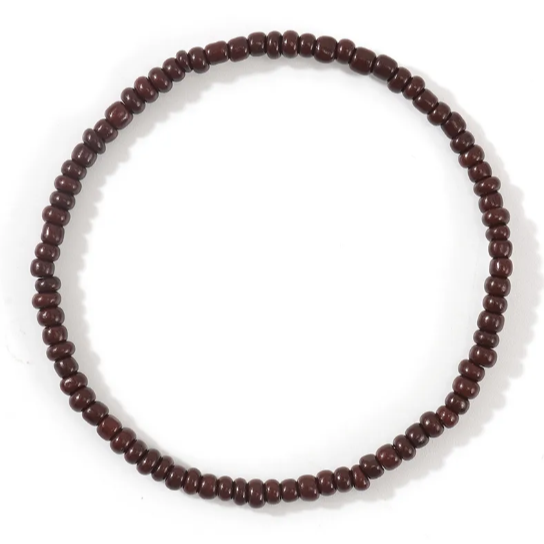Brown beaded bracelet on a white background