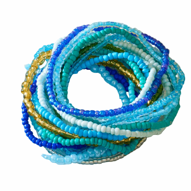 Stack of colorful beaded bracelets on a white surface