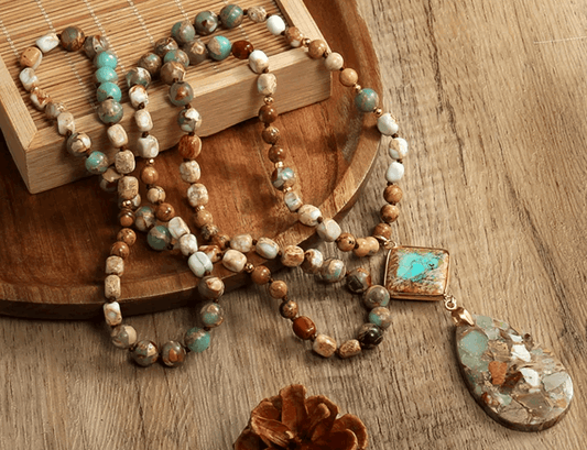 Necklace with a large pendant on a wooden surface