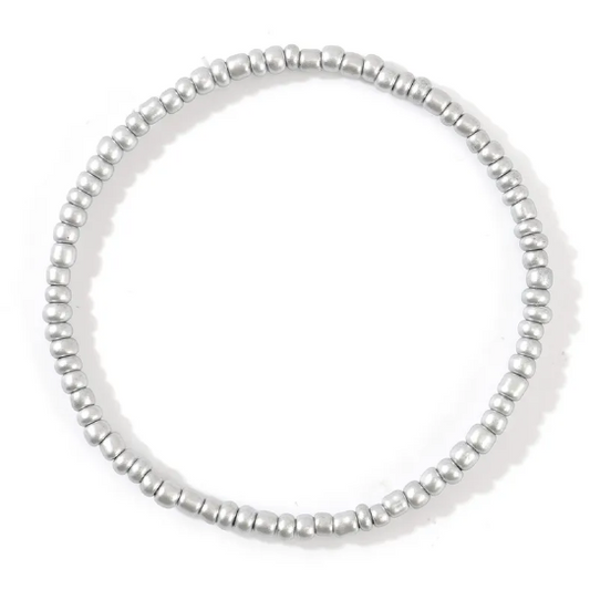 Silver beaded bracelet on a white background